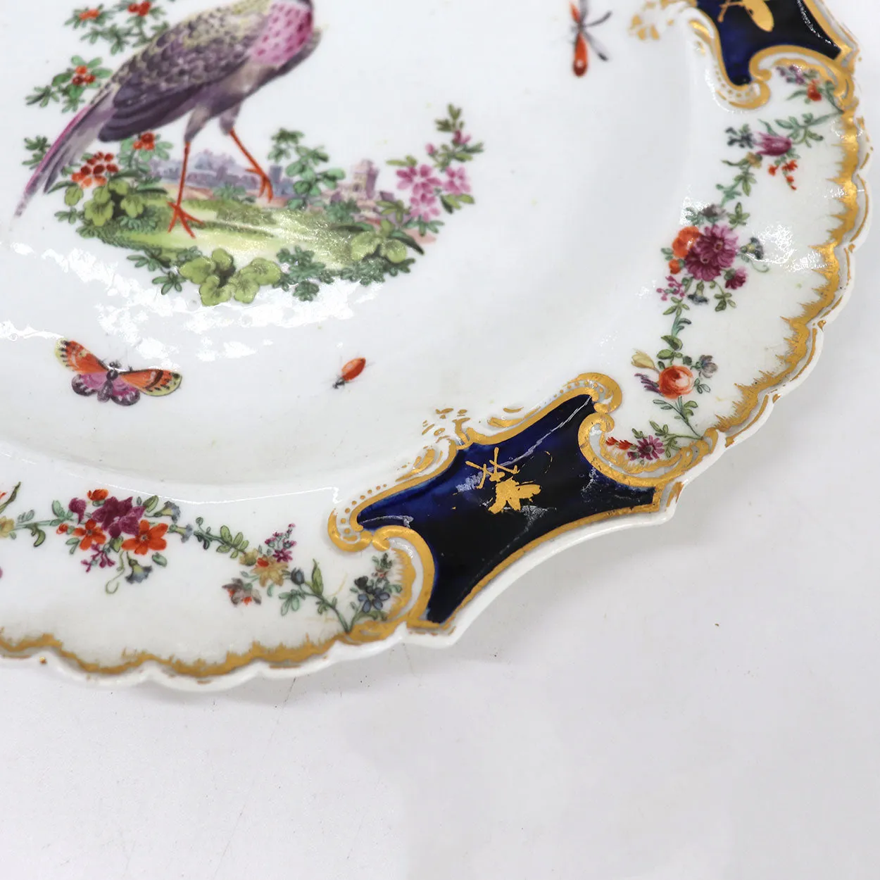 English Chelsea Soft Paste Porcelain Exotic Bird Gilt and Mazarine-Blue Mecklenberg-Strelitz Type Plate