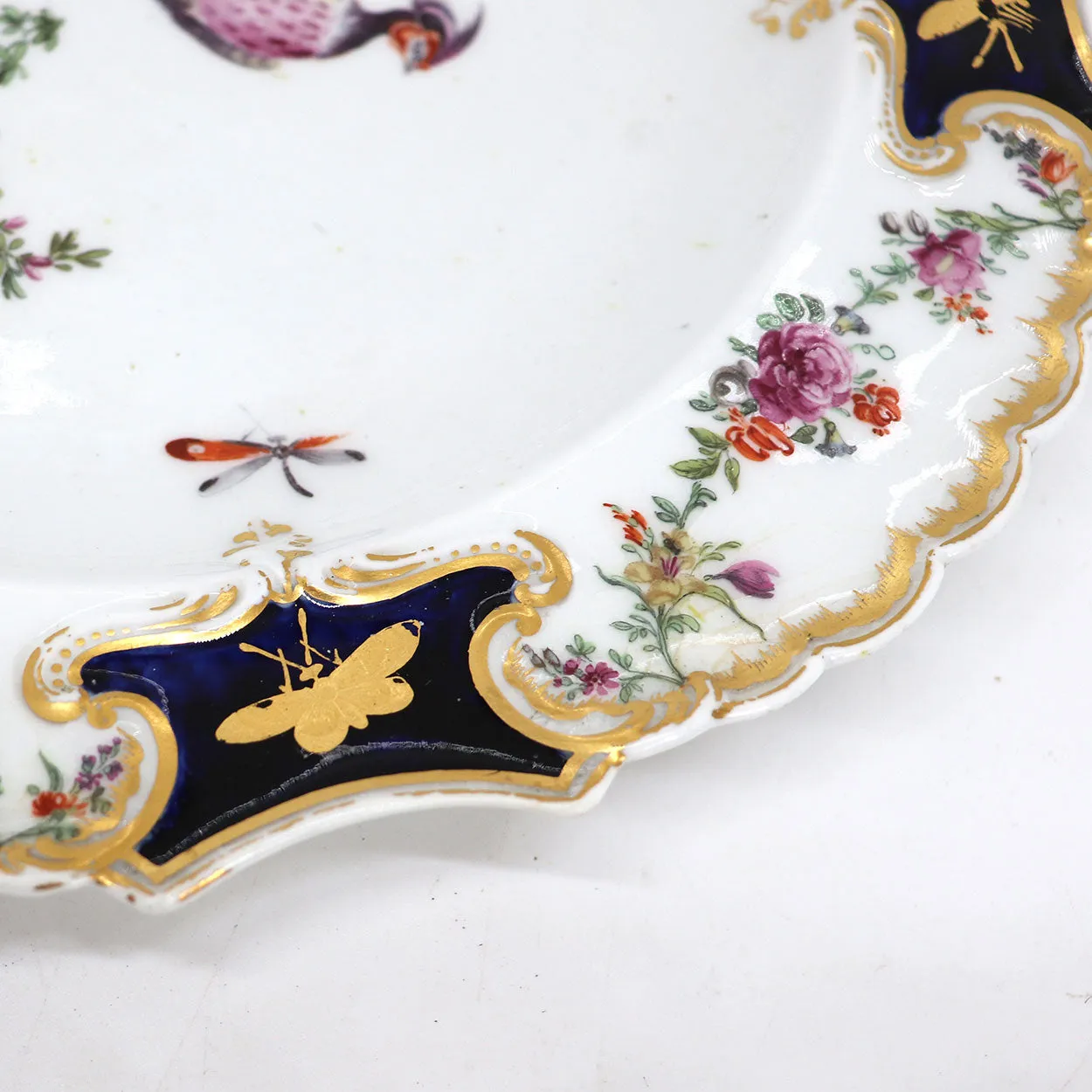 English Chelsea Soft Paste Porcelain Exotic Bird Gilt and Mazarine-Blue Mecklenberg-Strelitz Type Plate